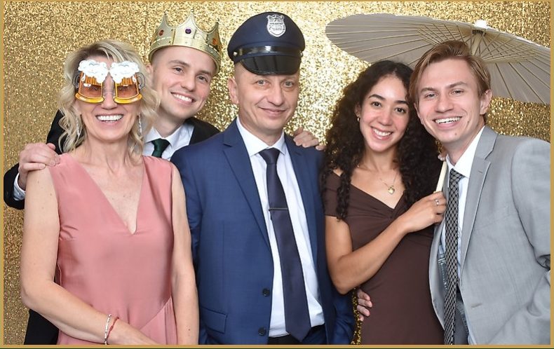 Wedding guests in props at a New Jersey wedding photo booth